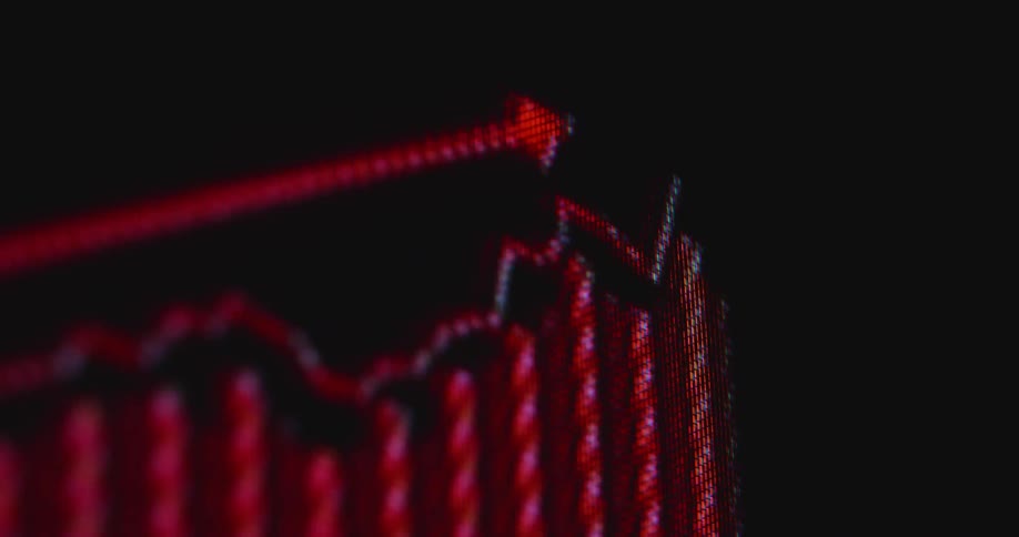 Pixelated computer screen displays a red graph with statistical data showing the increasing inflation rate as prices for everyday goods and living costs in the US rise with a very high CPI or consumer price index causing financial problems