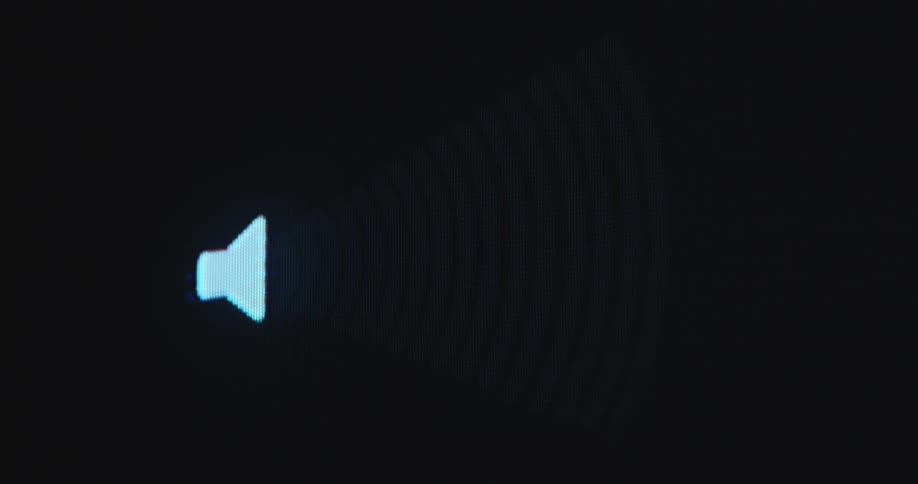 Loud speaker icon or audio emoji spreads a viral song online through various soundwaves moving across the black background on a dark television screen as the music is being played with a digital audio player