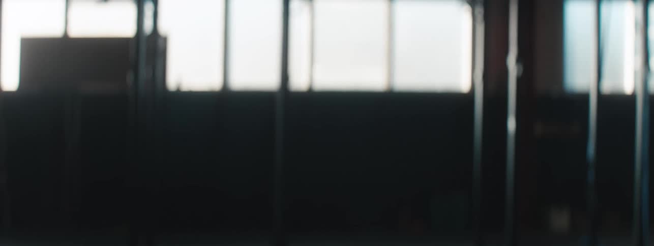 Close up of a young woman exercising in the gym