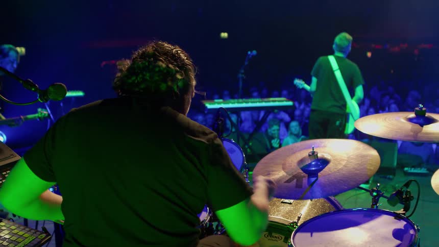 Band performing for a crowd of people