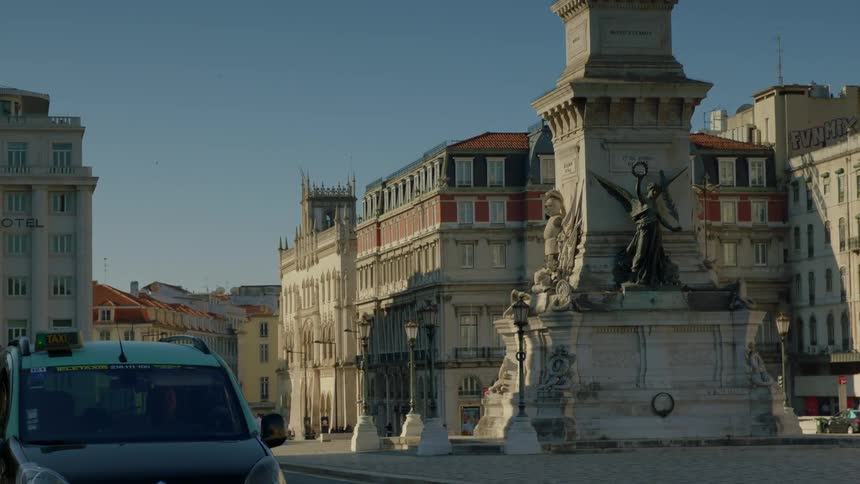 Vehicles drive in a city