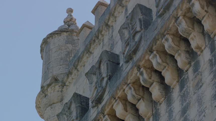 A stone building stands overhead
