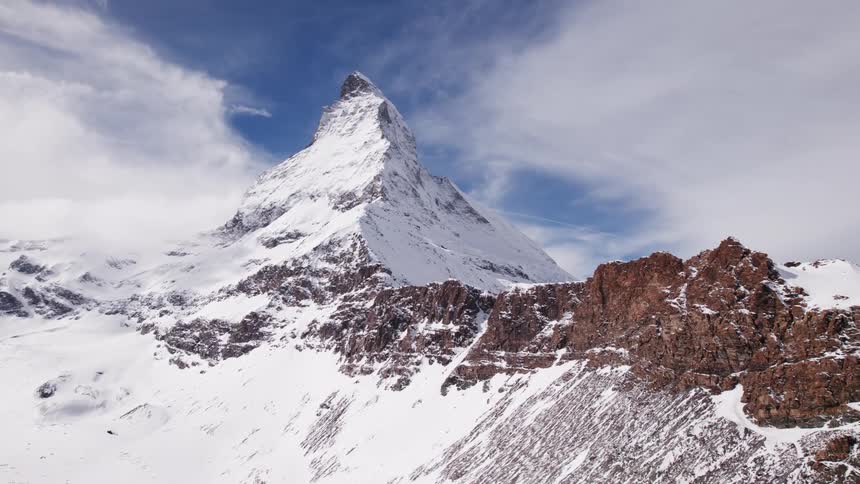A mountain is covered in snow