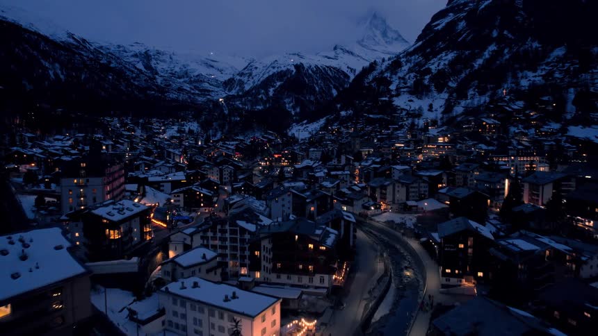 A snowy mountain resort at night