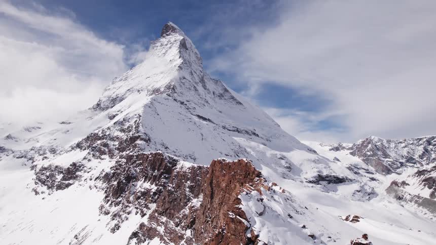 Landscape of a snow covered mountain at midday