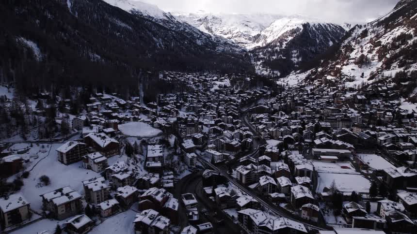 Picturesque snowcovered town surrounded by mountains