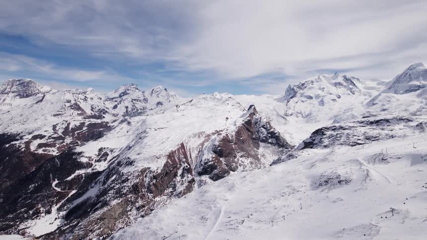 Aerial landscape of snowy mountain ranges