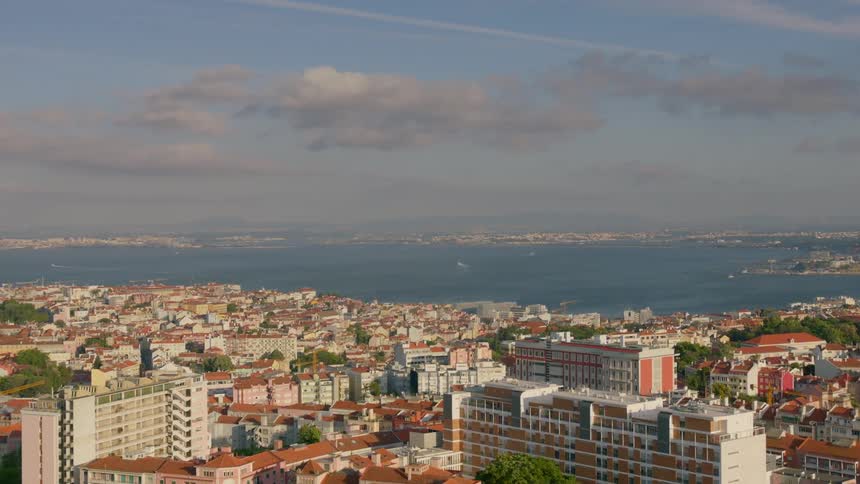 The city below is lined with water
