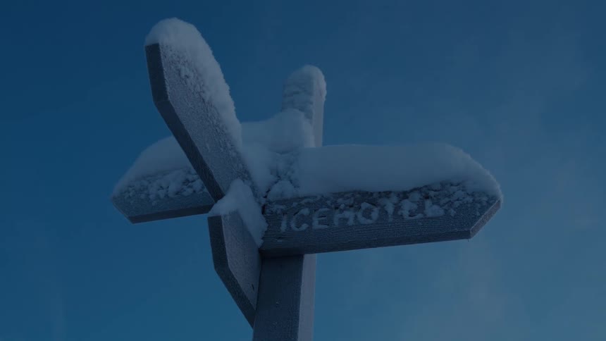 A signpost covered in snow
