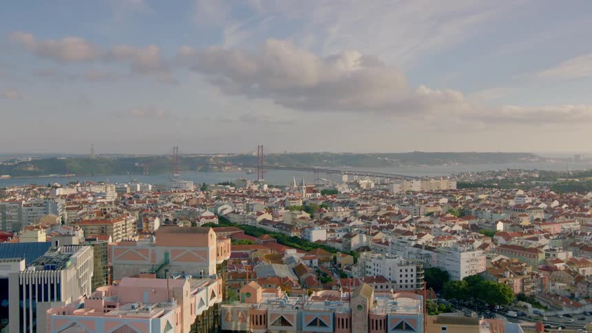 City buildings are shown with a river in the distance