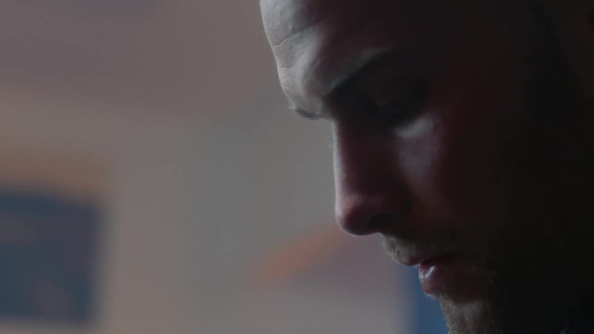 Close up of a man's face looking disappointed