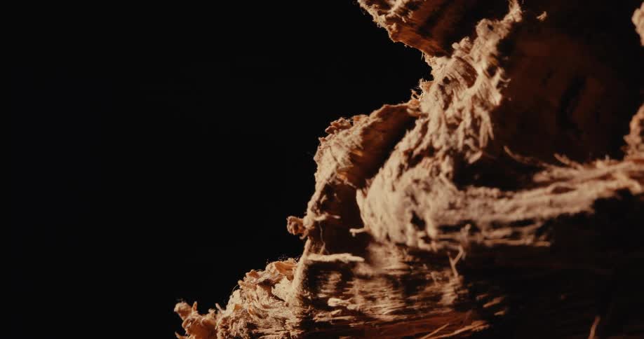 Aged wood against a black background
