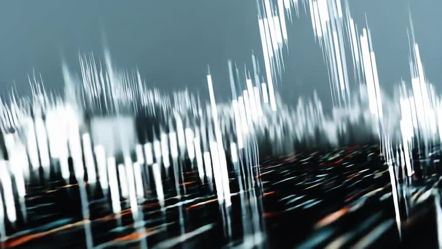 Digital candlestick charts hover over a swiftly moving surface of black streaked with blue and orange shades
