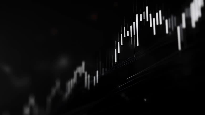 Close up of an electronic screen displaying a trading interface in white and black