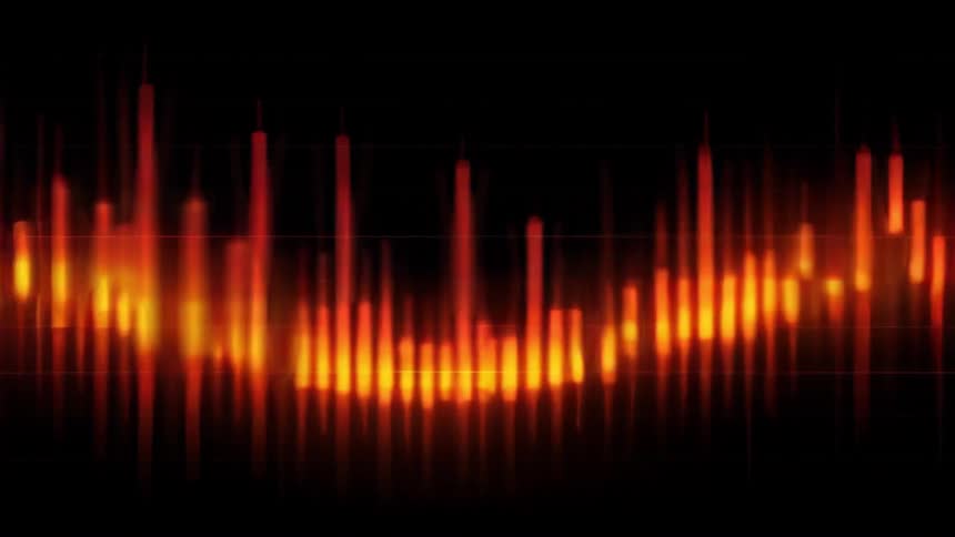 Candlestick chart in orange contrasts with a black background