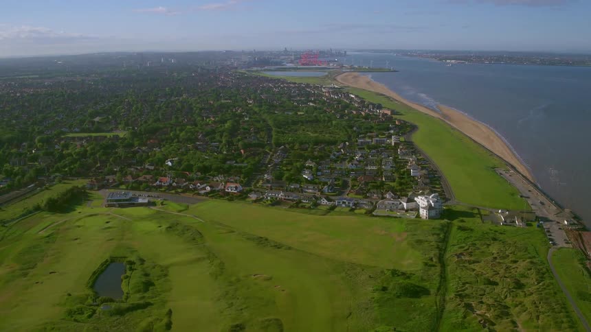 Aerial view of a city next to the coast