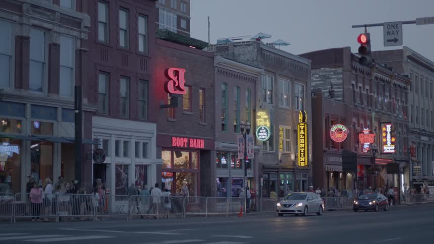 Blurry image of a city street coming into focus