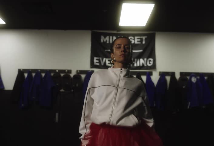 A martial arts student trains in a martial arts studio