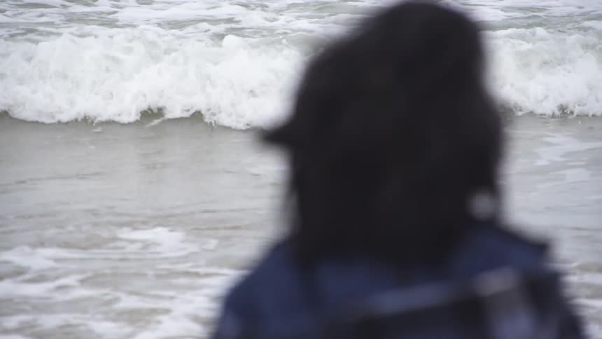 Waves crashing against the beach