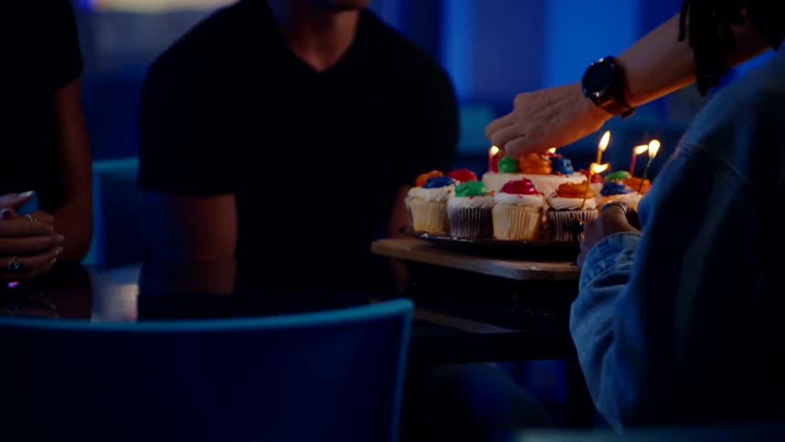 Candles are put on the birthday cake