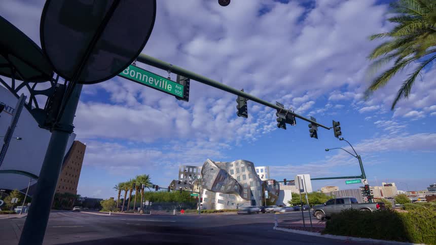 A busy road intersection in Las Vegas during daytime