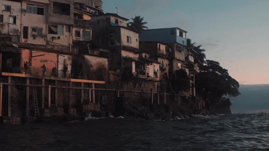 Community at the foot of a mountain by the sea