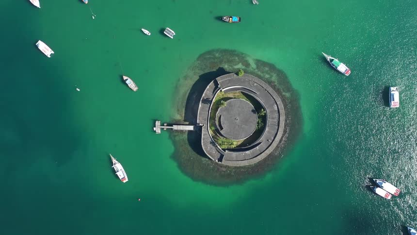Aerial of still boats on sao marcelo fort at daytime