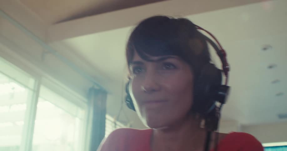A woman plays a video game