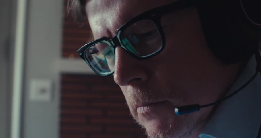 A man takes a business call
