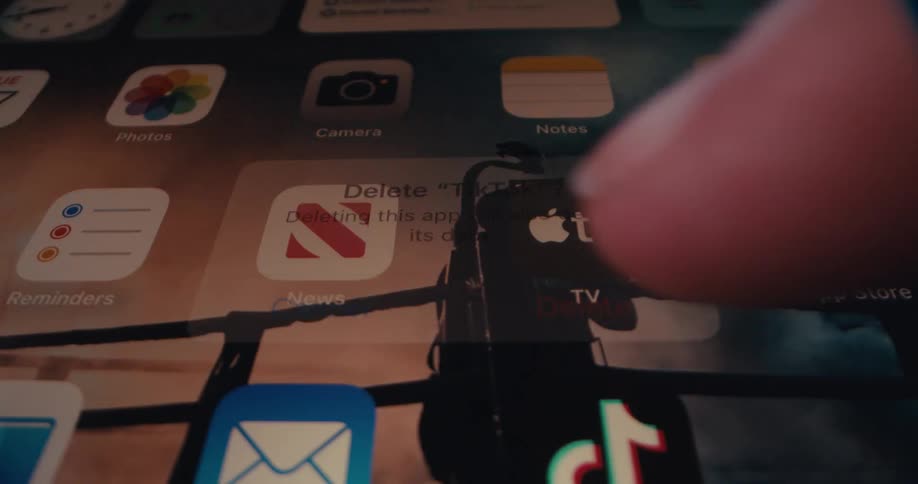 After a person presses the delete button on the confirmation popup the tiktok app icon disappears from the ipads home screen