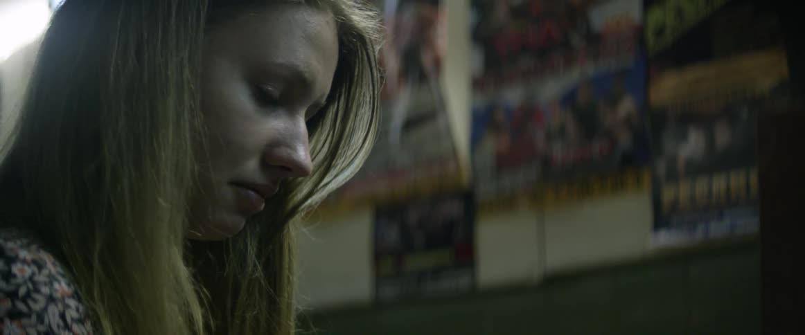 Woman looking depressed looks down
