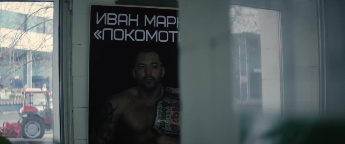 A poster hangs on the wall