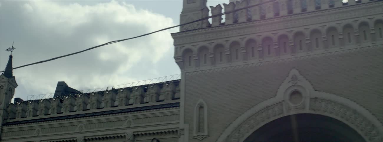 A castle like buildings on a cloudy day