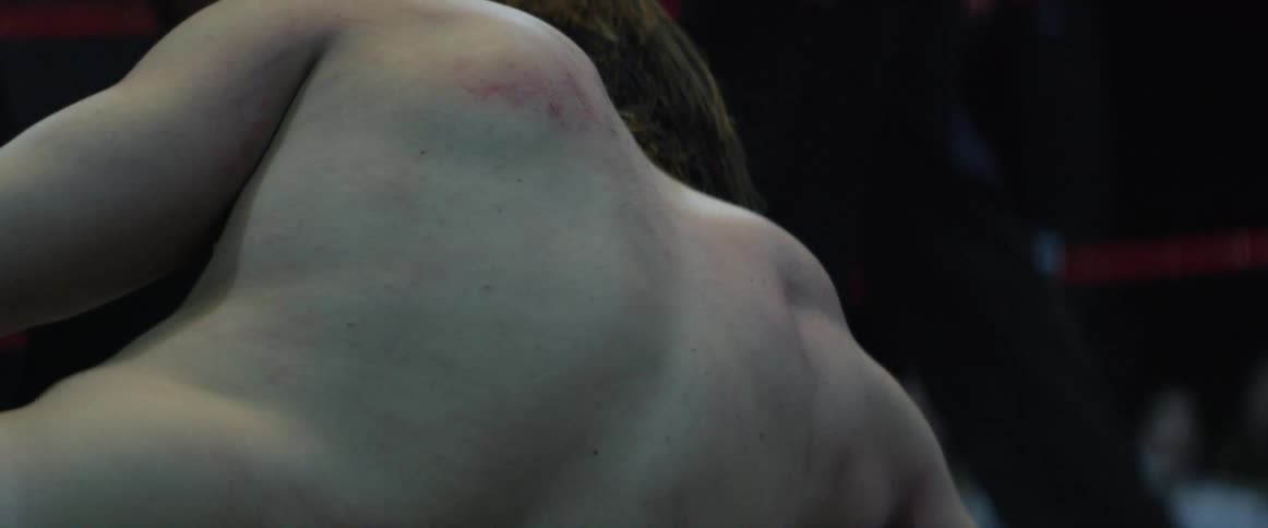 Close up of two men wrestling