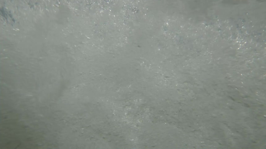 Underwater when a big wave crashes