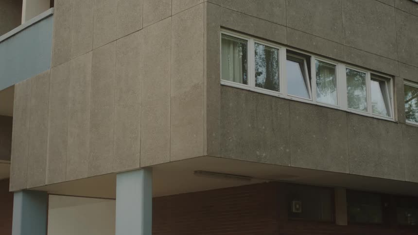 A residential building in the city around midday