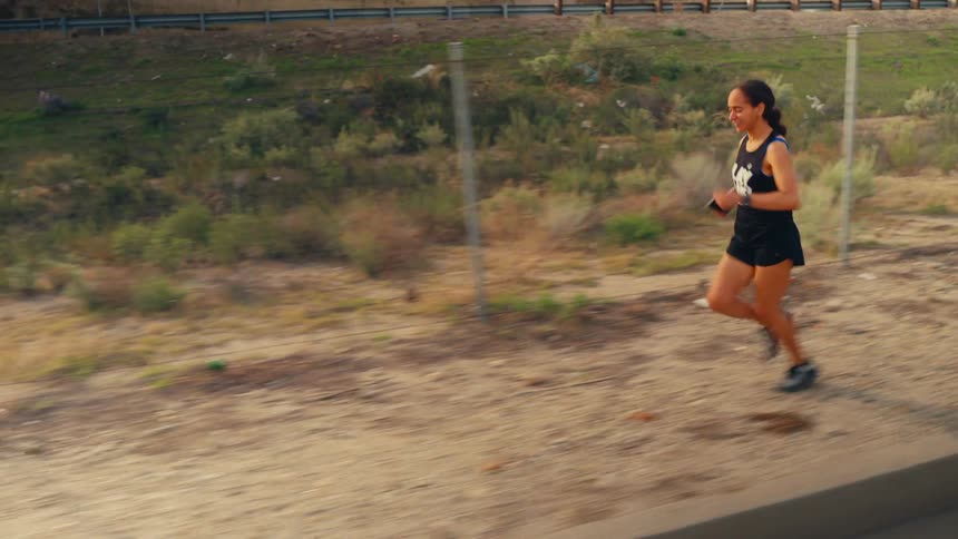 A woman jogging outdoors for exercise