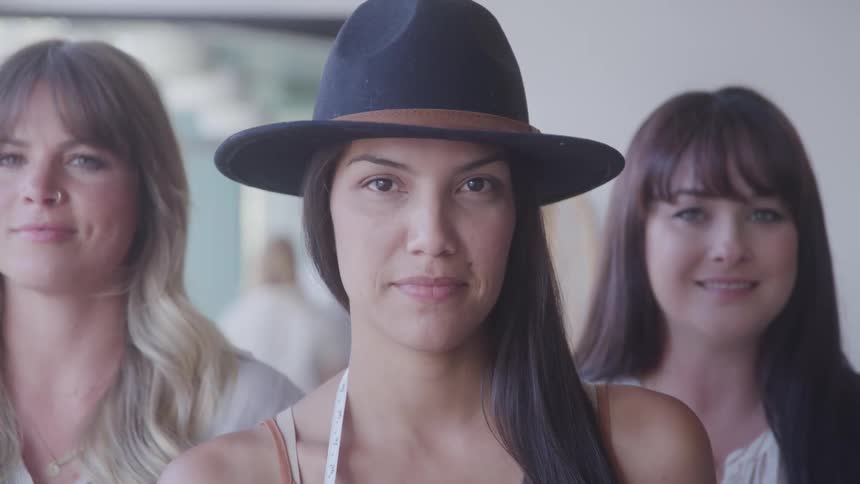 Three women in portrait with happy expression