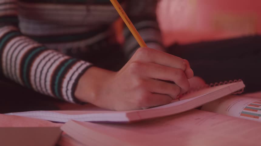 A girl takes notes