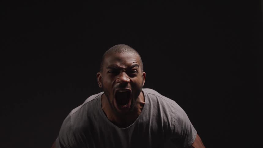 Man shouting in an imposing manner