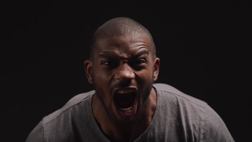 The man screams and flexes