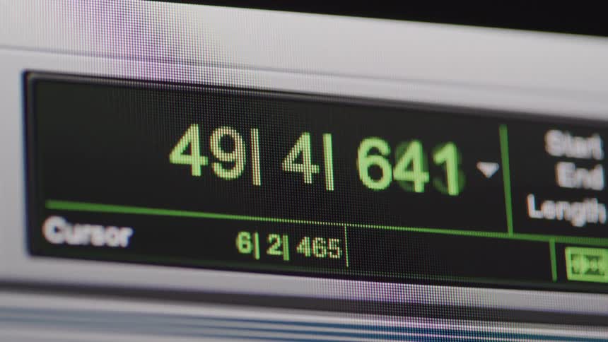 A countdown clock with three sets of digits in green counting down