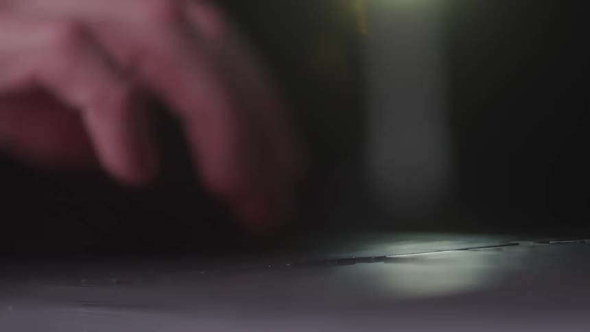 Fingers typing on a keyboard