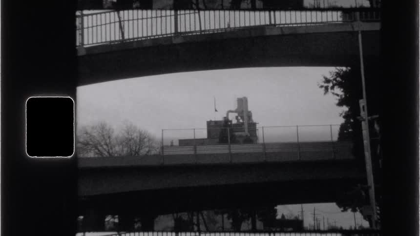 Urban street with viaducts and buildings