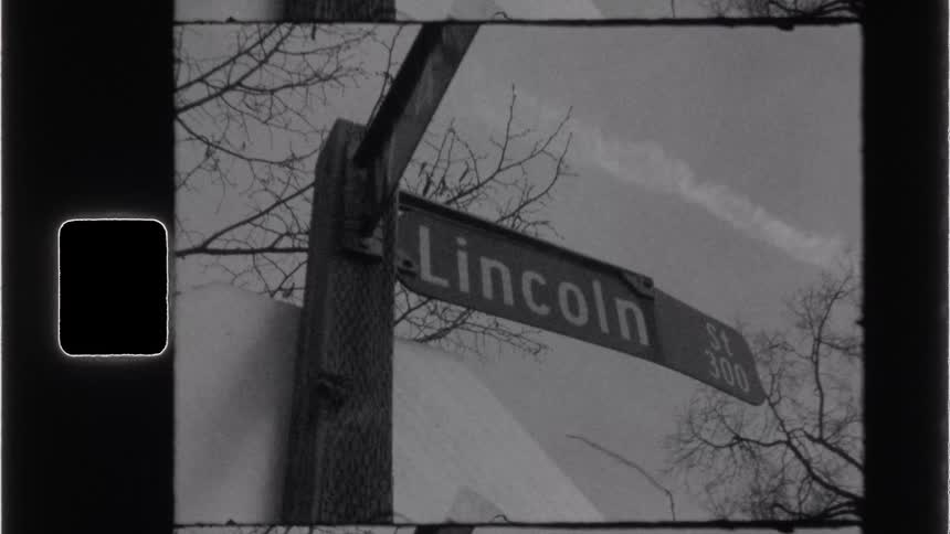 Street nameplate on a cloudy day