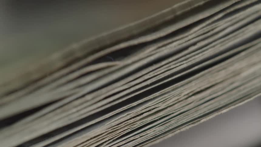 Money being counted in a machine
