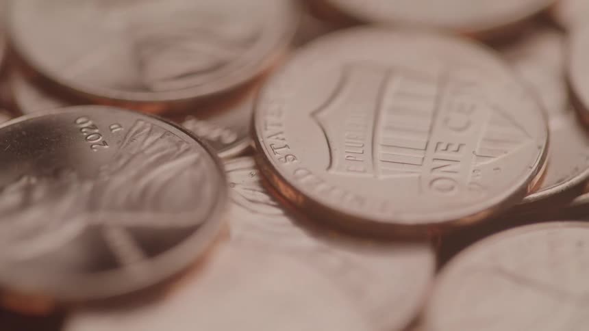 A close up view of several us pennies