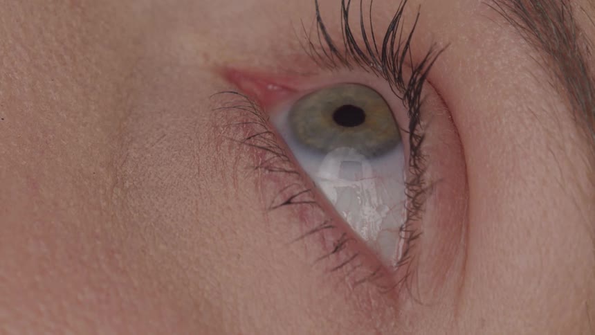 Close up of a womans green eyes