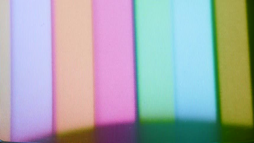 Rainbow bars are displayed on the television screen