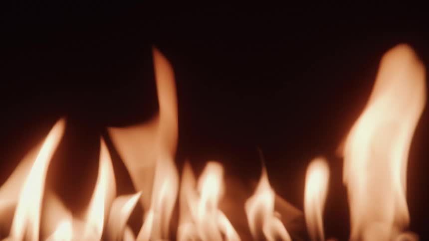 The flames are flickering in the fireplace